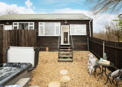 Dreamwood, a luxury, dog-friendly holiday chalet with a hot tub, sleeps two | Downwood Holidays, Dorset