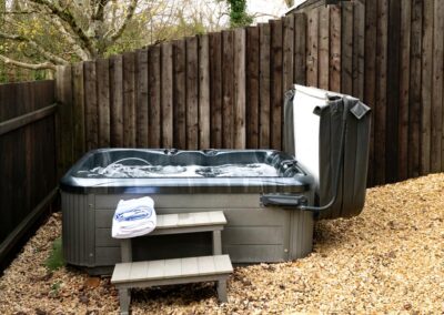 Dreamwood, a luxury, dog-friendly holiday chalet with a hot tub, sleeps two | Downwood Holidays, Dorset