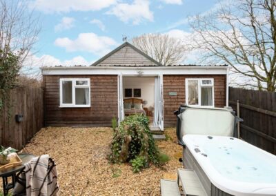 Meadow Cottage is a luxury, dog-friendly holiday chalet with a hot tub, sleeps two | Downwood Holidays, Dorset