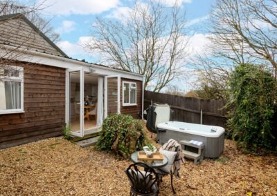 Meadow Cottage is a luxury, dog-friendly holiday chalet with a hot tub, sleeps two | Downwood Holidays, Dorset